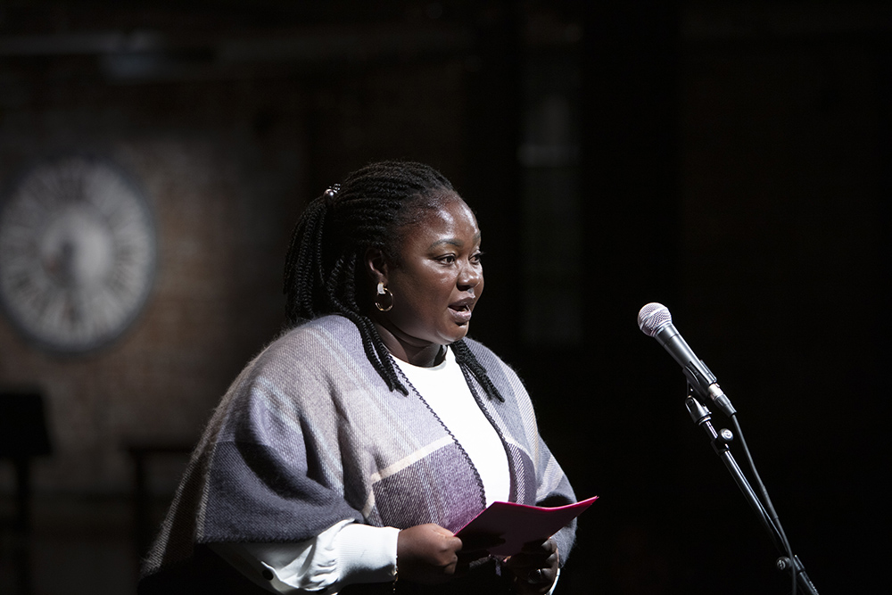 Photo of Nakinti reading for Stories for Freedom